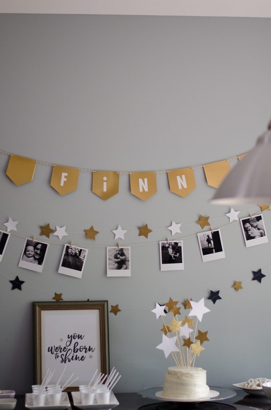 I love how our banners and garlands turned out with the gold stars and pictures of Finn during his first year.