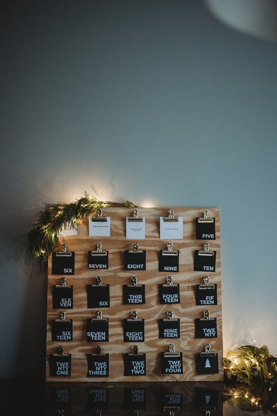 black cards on a wooden board - modern black and white advent calendar