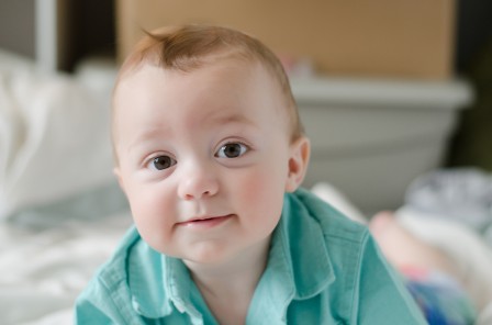 Miles | 10 month photos  -Raised eyebrows and adorable hair flip