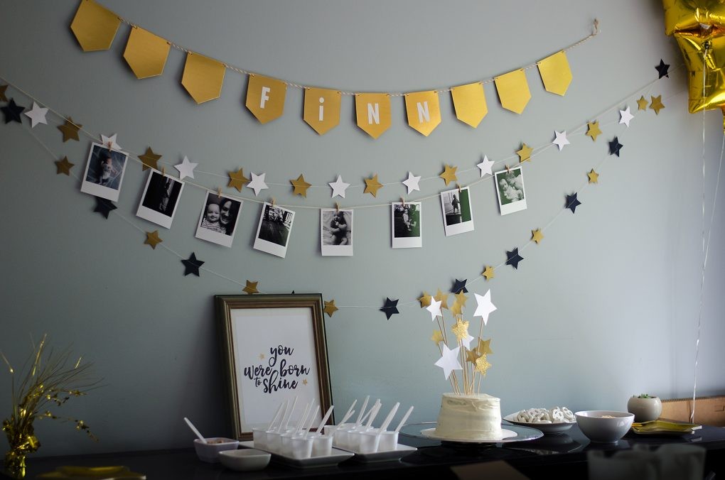 I tried to keep the cake/dessert table minimal this time with a basic white cake, some gold star balloons and a poster that says "You were born to shine"